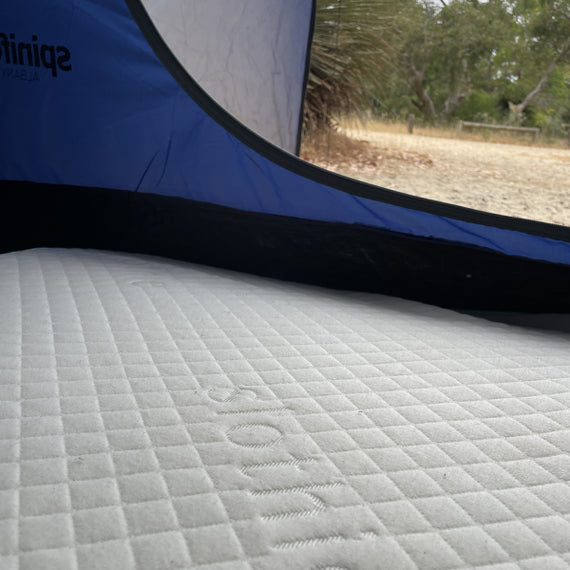 Slothie portable sleep product rolled for travel and storage